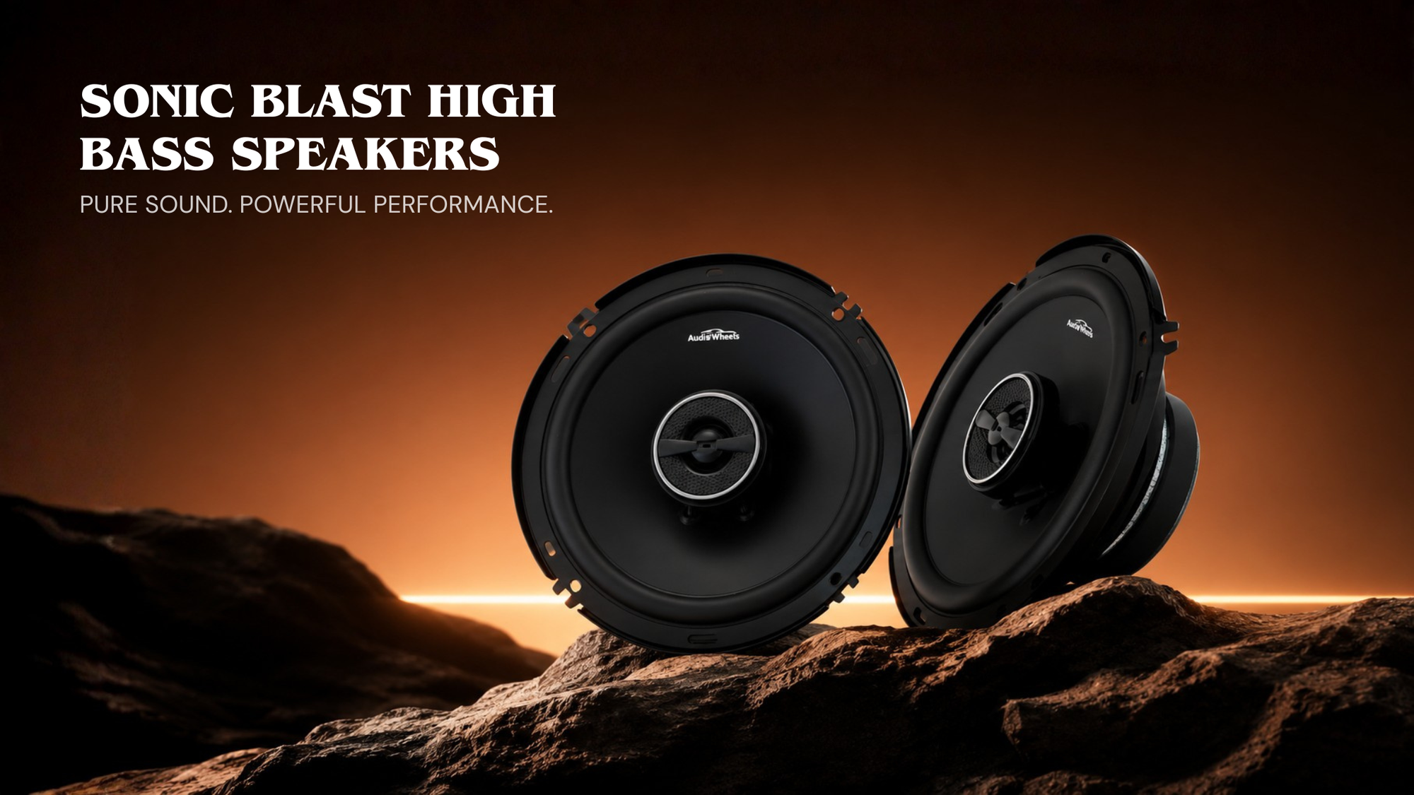 Two high bass speakers on a rocky surface with an orange sky background, featuring the brand 'Sonic Blast'.