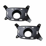 Two black automotive fog light brackets on a white background

