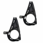 Two black car fog light covers on a white background

